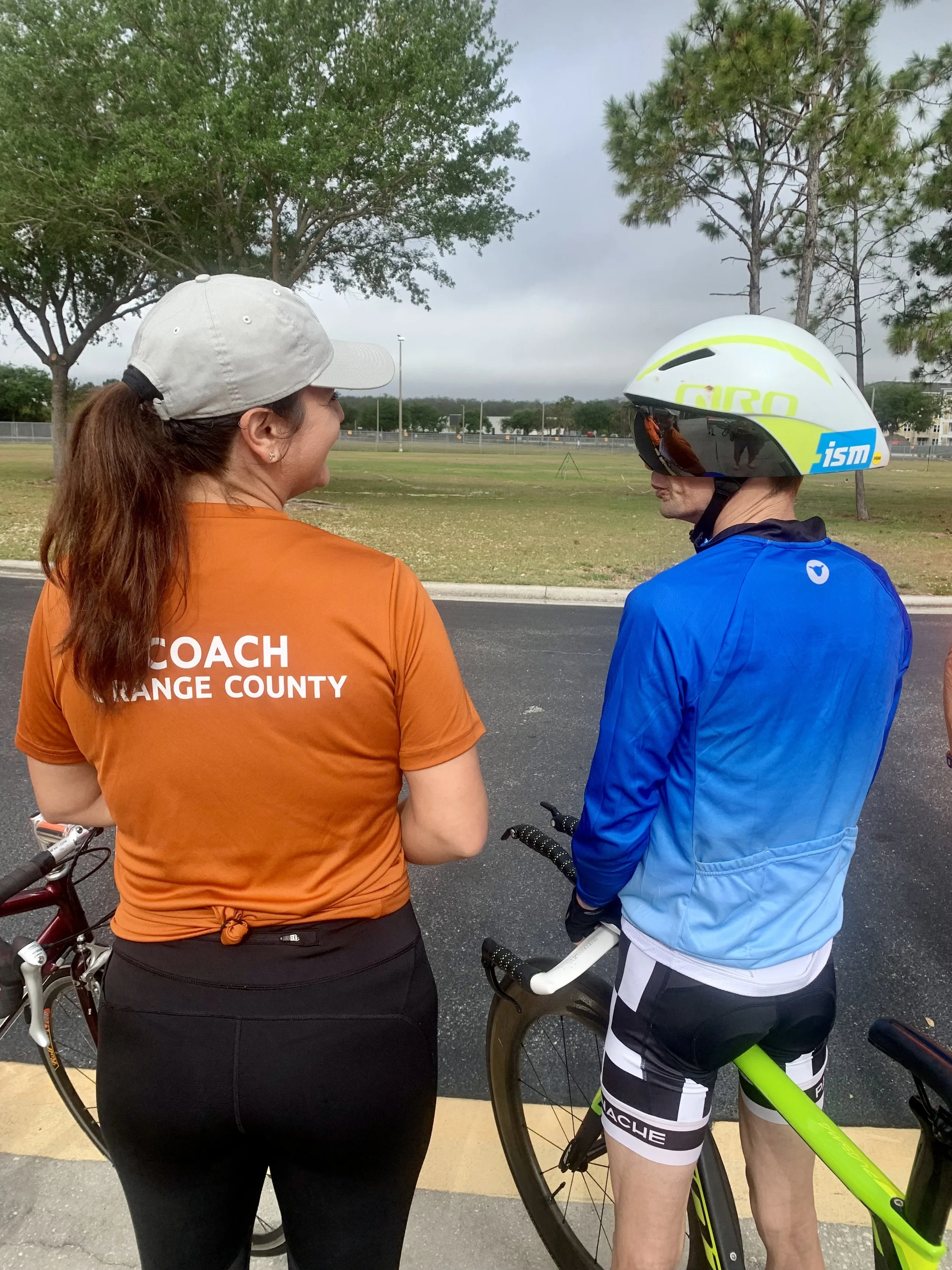 Sports coach with athlete