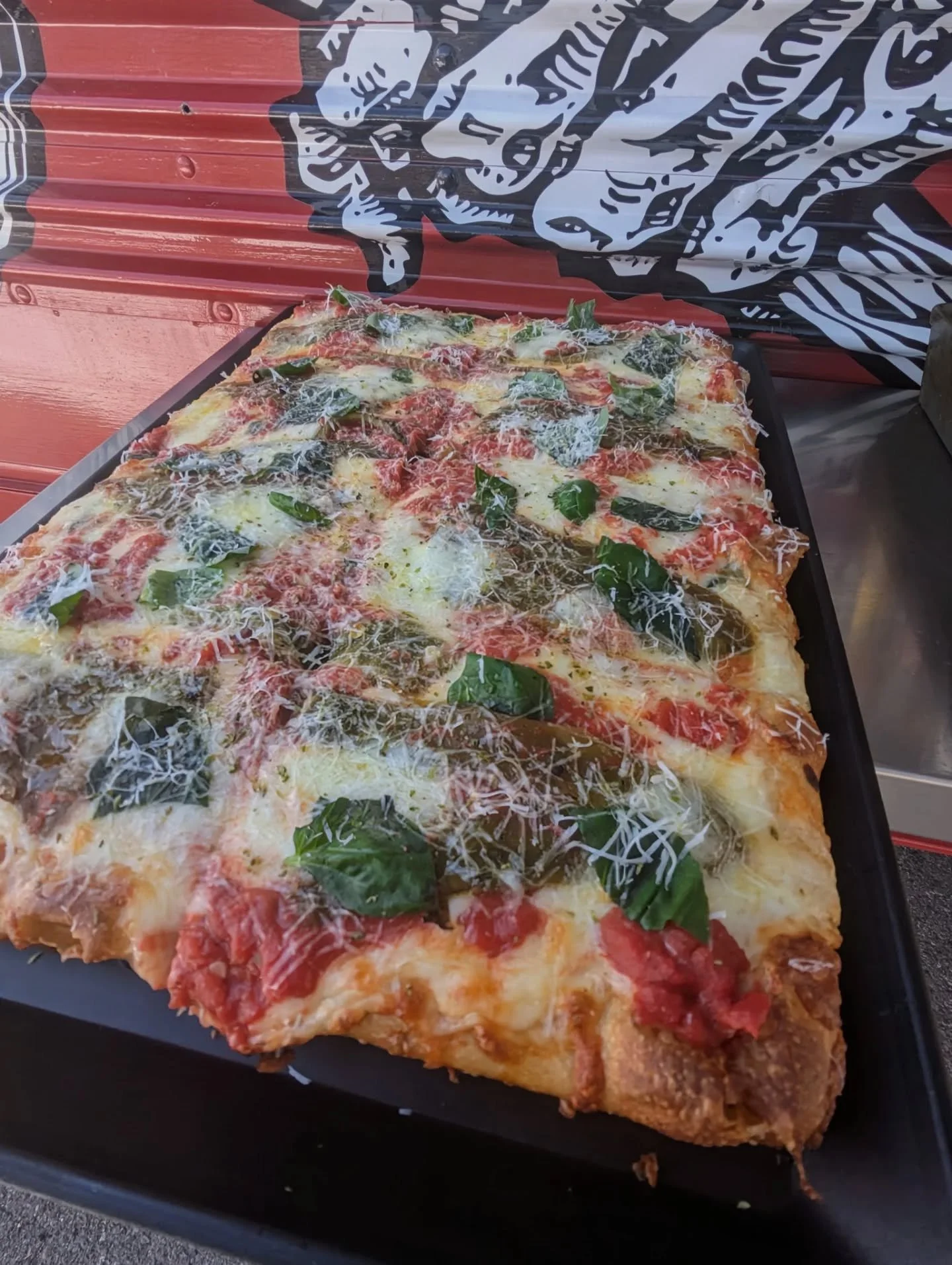 The new special is The Green Chile Grandmaaaaaaaa! Or the Green Chile Margherita(not pictured) if the round pies are more your thing. Such a simple pie, but so good. Tomato sauce, fresh basil, hand stretched fresh mozzarella made in the bus, whole pi