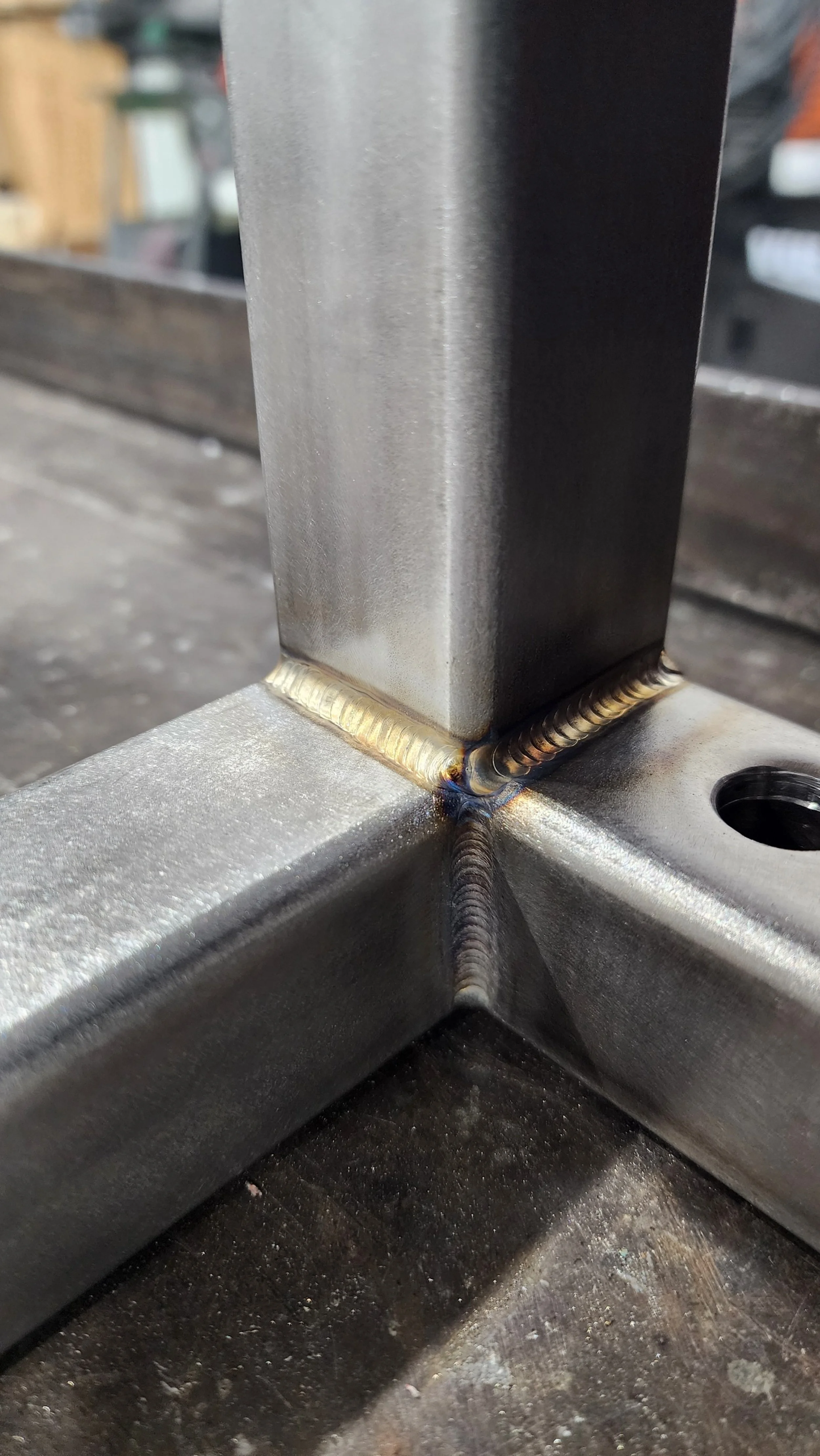 Close up of welded corner joint on the dual heat exchanger frame.