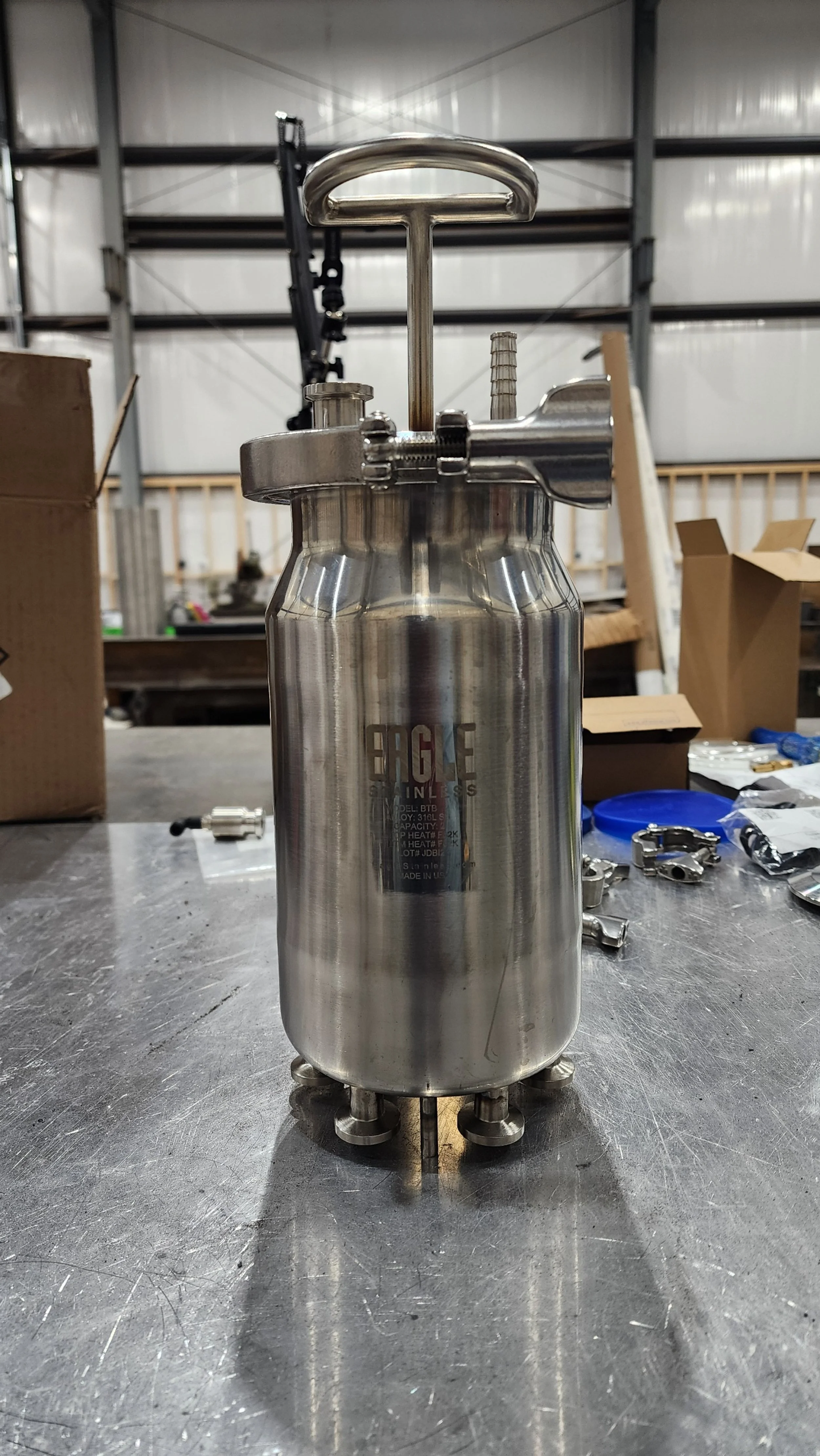 Custom prototype product distribution tank for a vial filling machine.