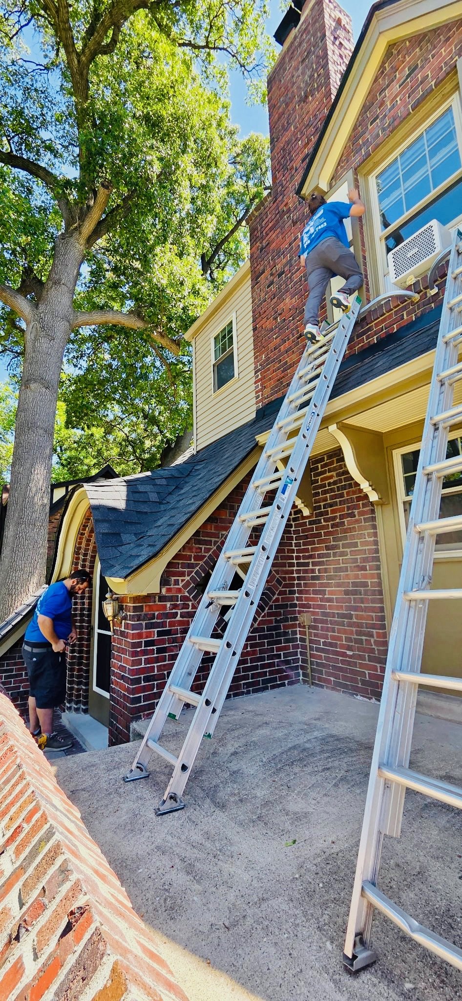 M&B technicians completing an upper-level exterior window repair