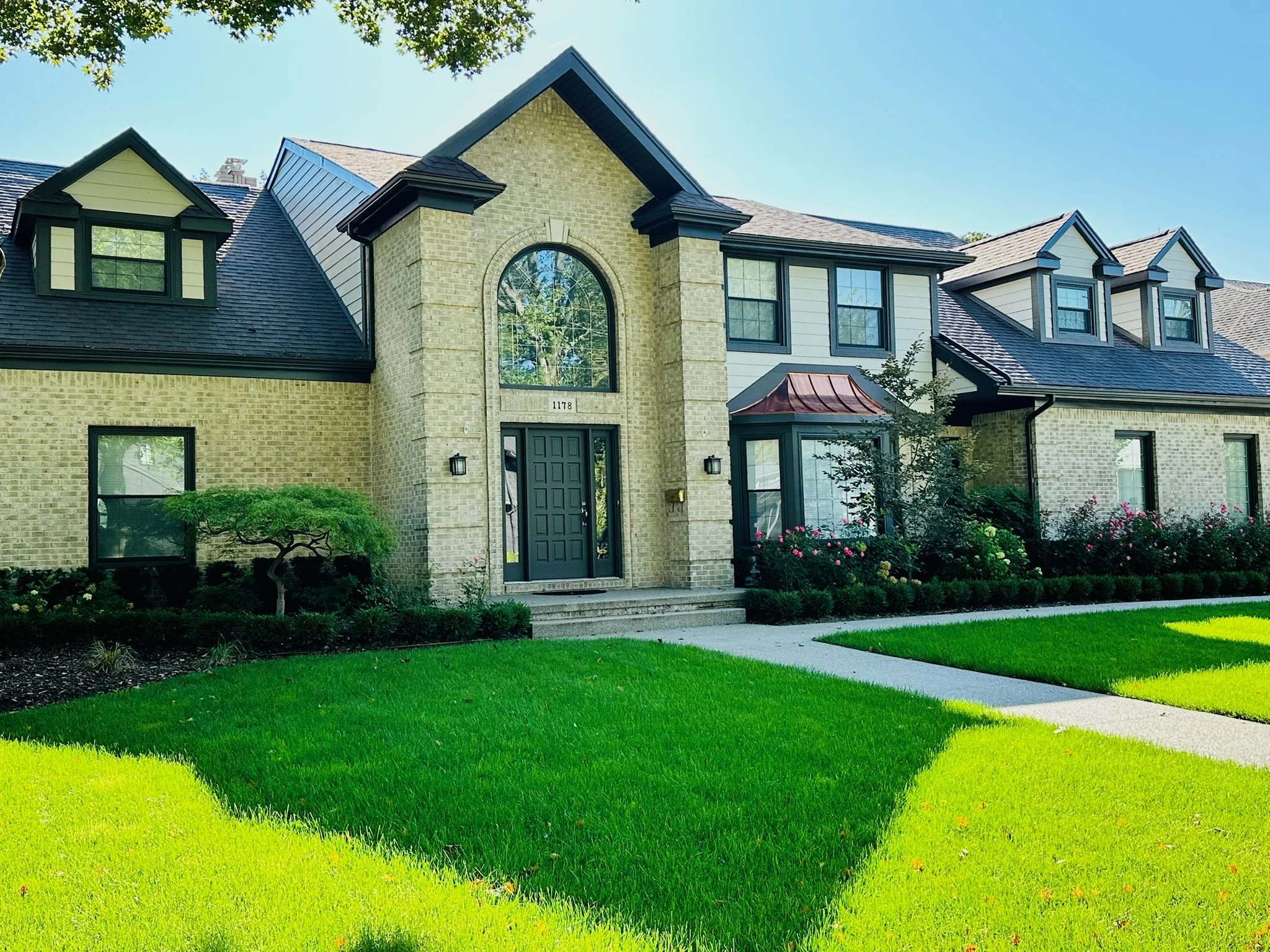 Residential screen project showing custom-fit window openings