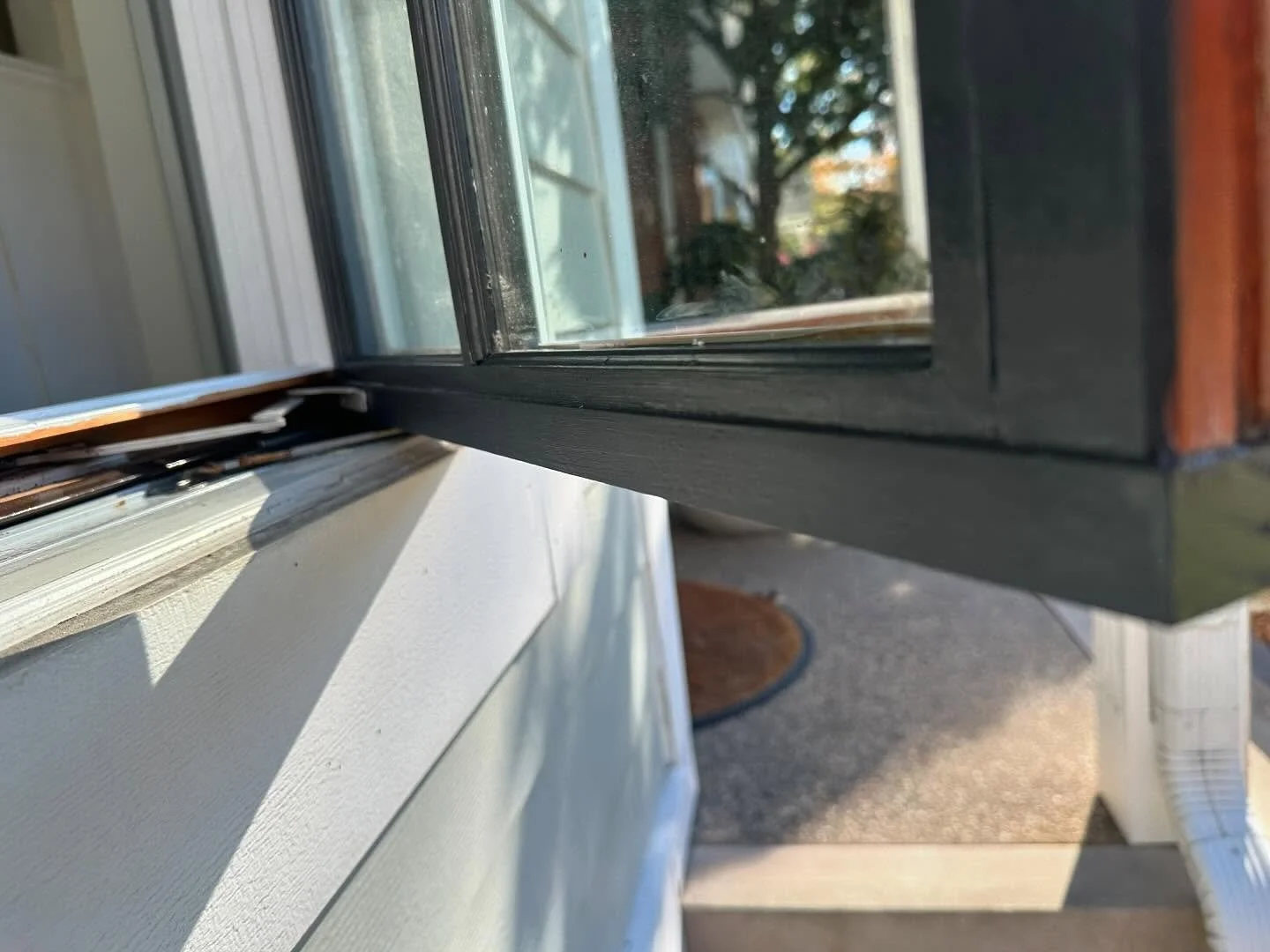 Modern black window repair and replacement project