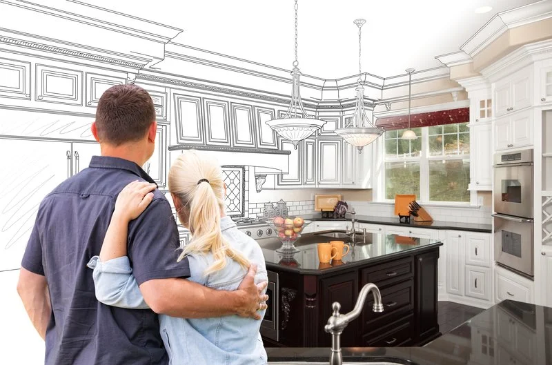 Remodeled kitchen with custom cabinetry, quartz countertops, and layered lighting