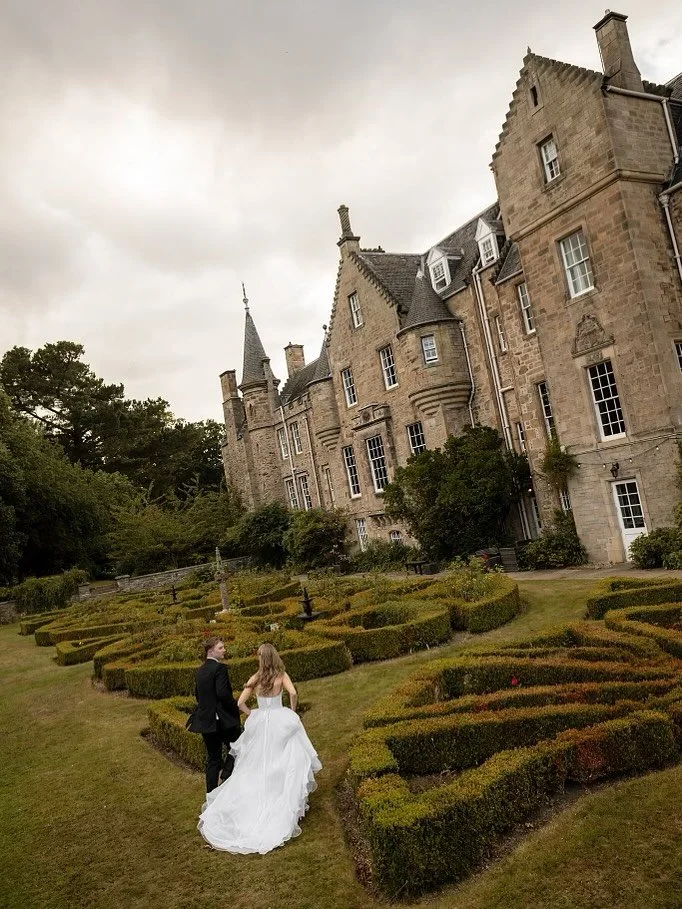 Rene & Nelson’s destination wedding this month, was in the heart of Scotland, surrounded by history at the charming Carberry Towers.
Rene’s gown was custom designed by Donna, crafted with a delicate French Chantilly lace corset bodic