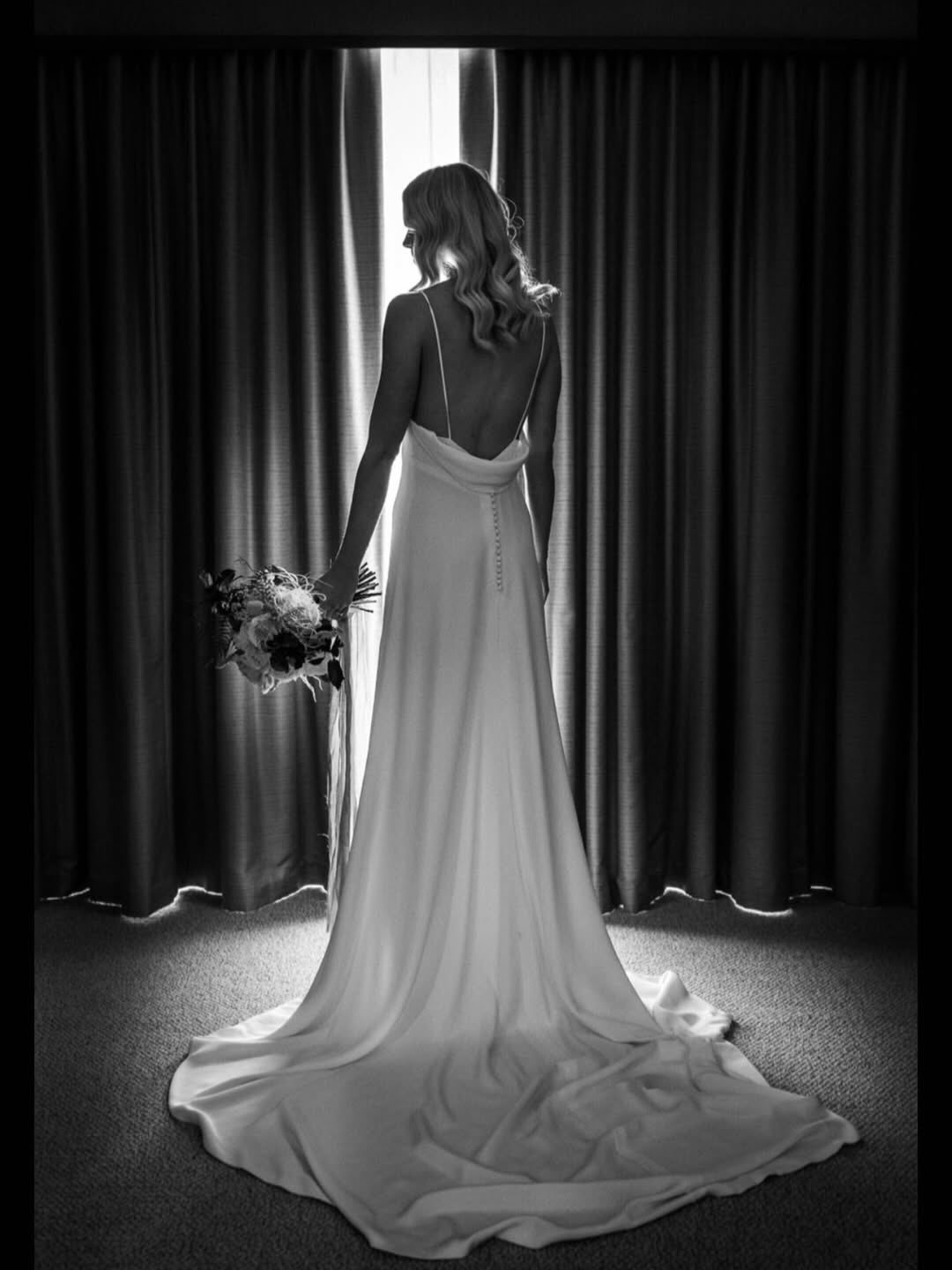 Designed for Kate, this silk crepe de chine gown is a timeless example of a modern bride 🤍

Seven years on, the plunging back, sleek silhouette, and statement split still looks so elegantly striking. 

The beauty of this design lies in its precision