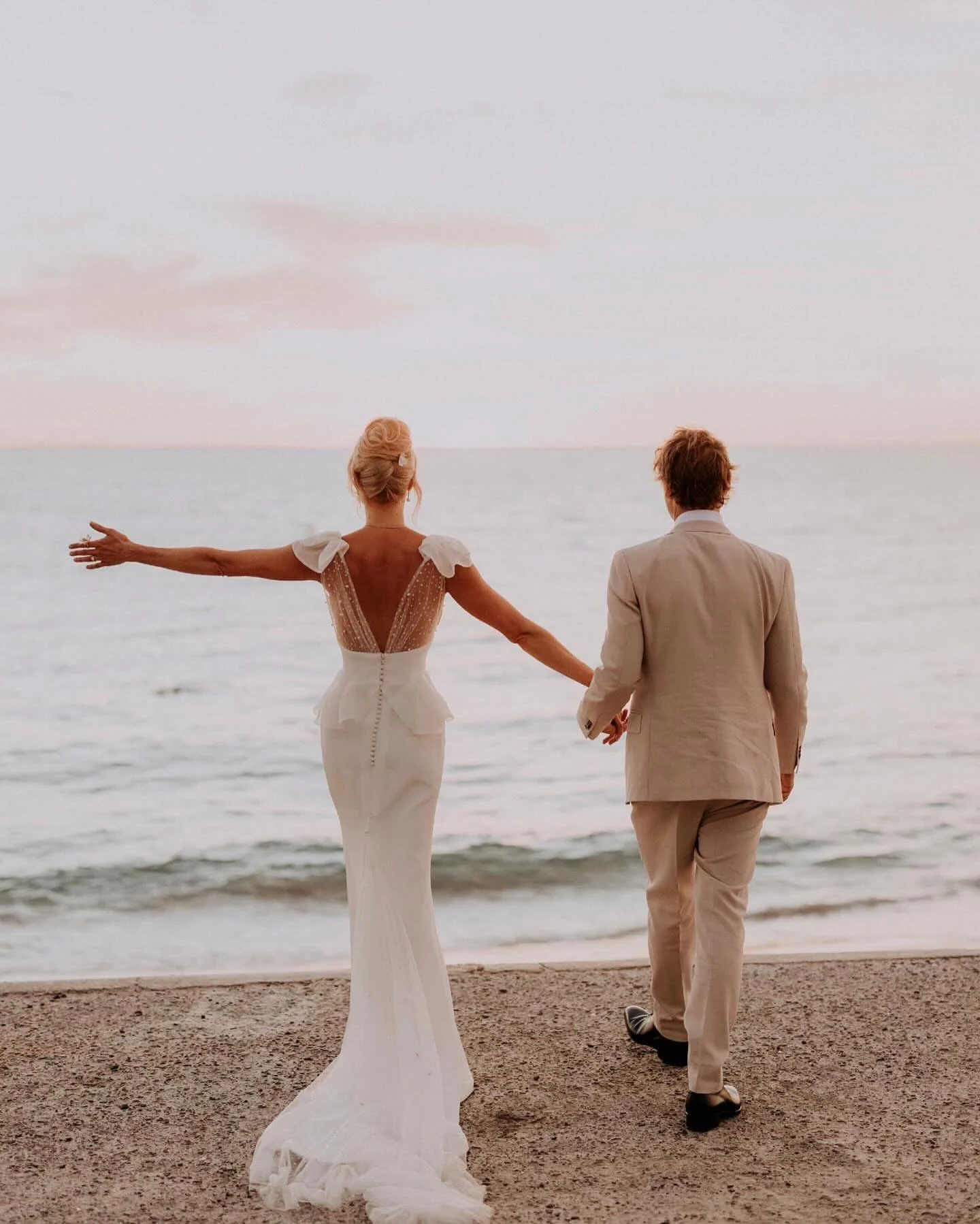 Sim brought her own artistic vision and collaborated with me to create her dream gown ✨🥂

Crafted in luxurious French crepe silk de chine and imported pearl-beaded tulle, the design feels soft and entirely her own, with every detail chosen to reflec