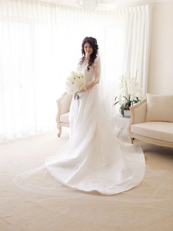 A truly special mother&ndash;daughter moment 🤍

On Francesca and Evan&rsquo;s wedding day, Donna designed Francesca&rsquo;s dream gown with an exquisite Italian lace centrepiece, a detachable silk train and a romantic waterfall cascade ✨✨

To comple