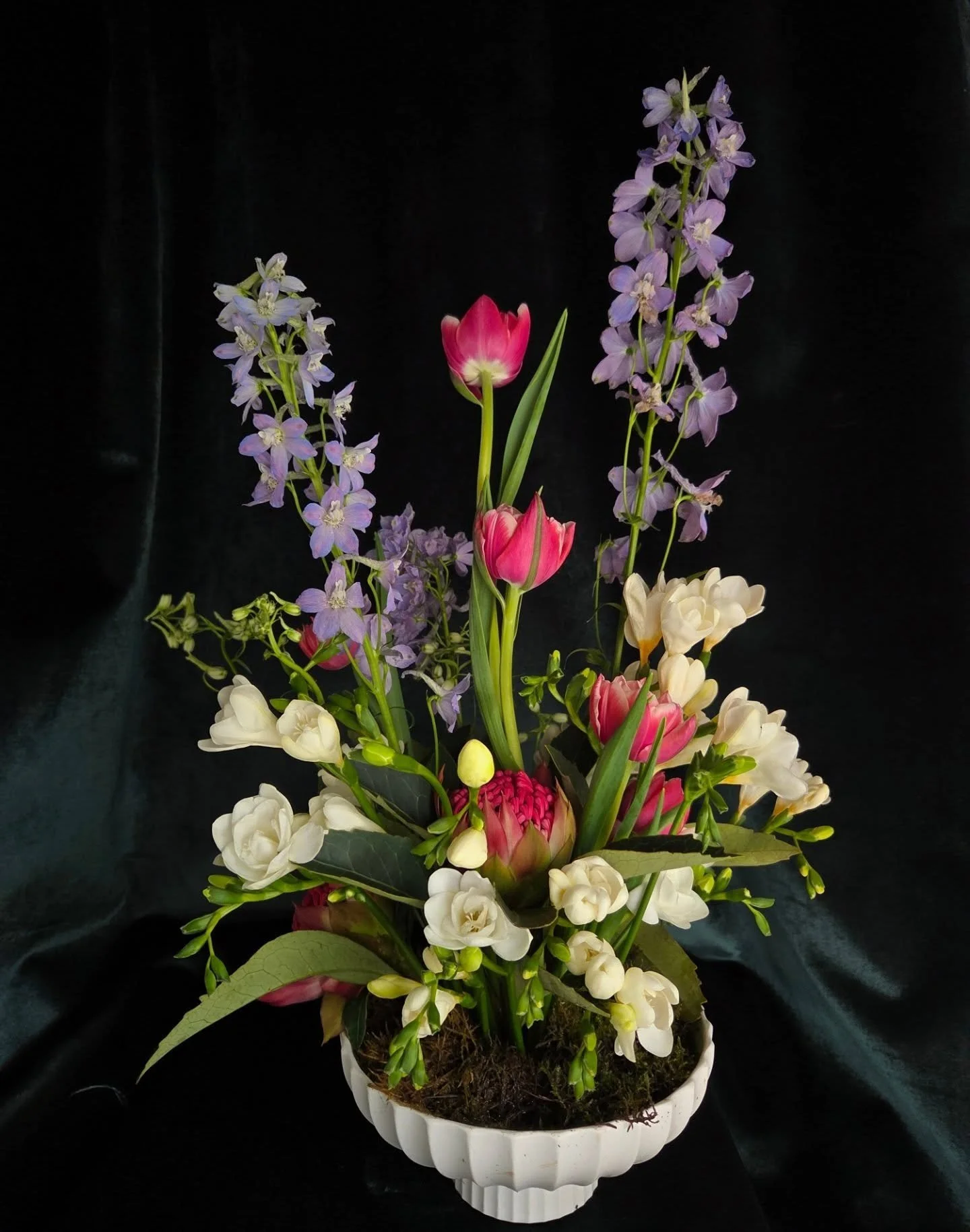 Fresh, feminine and full of promise, Spring blooms grounded in moss. I am really enjoying playing with these vases at the moment.