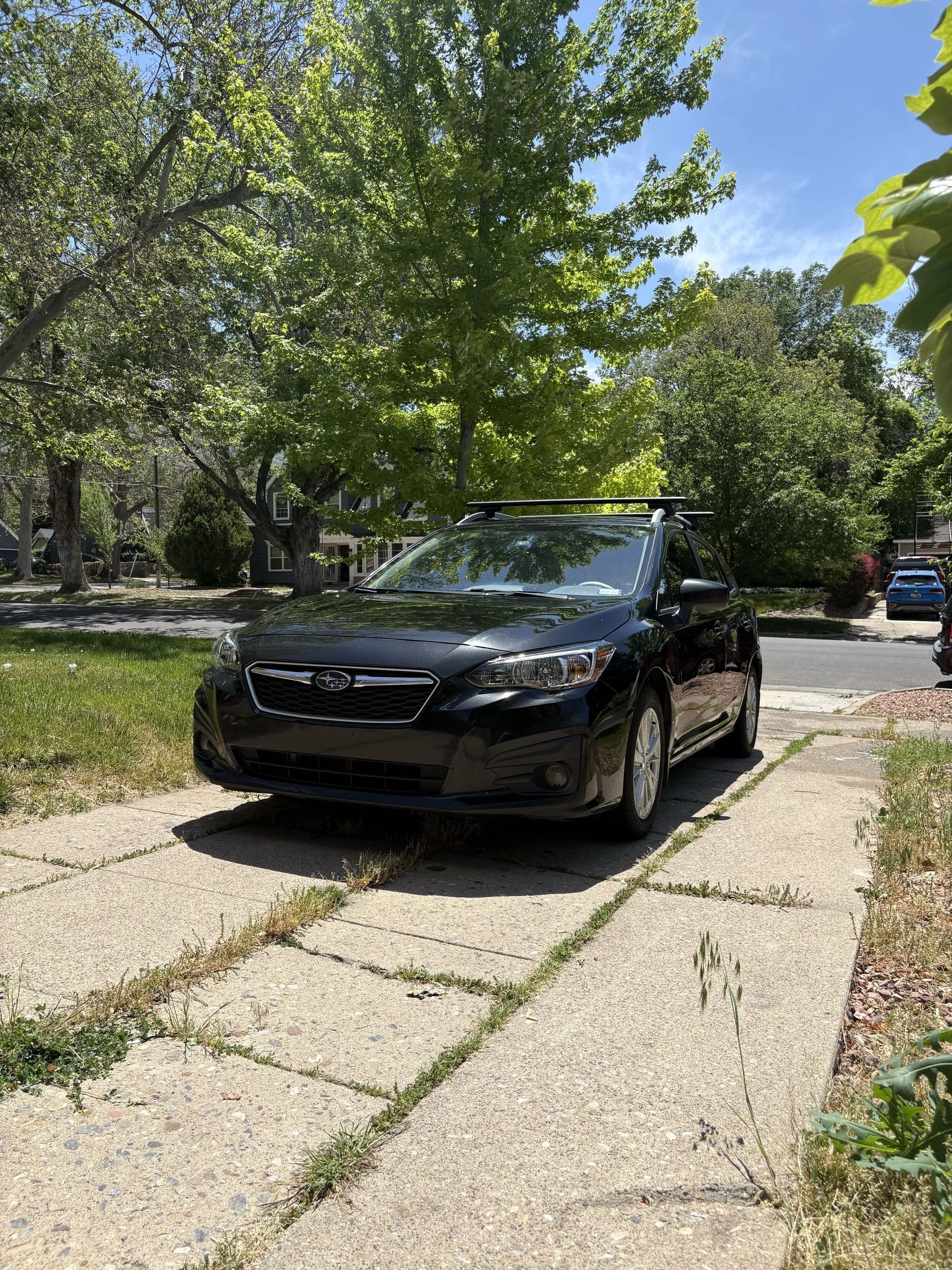 Detailed black subaru on driveway in north salt lake