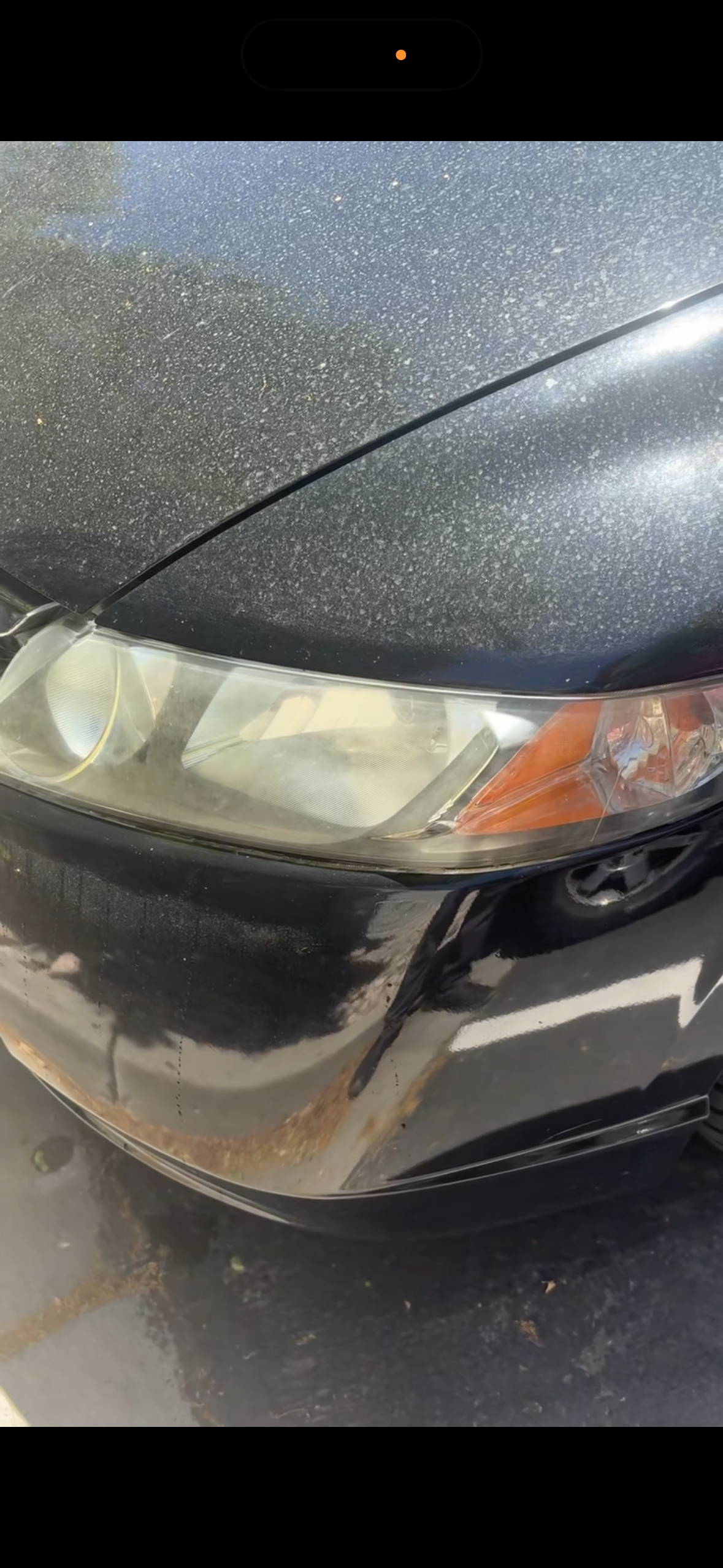 close up of headlight being yellow and hazy