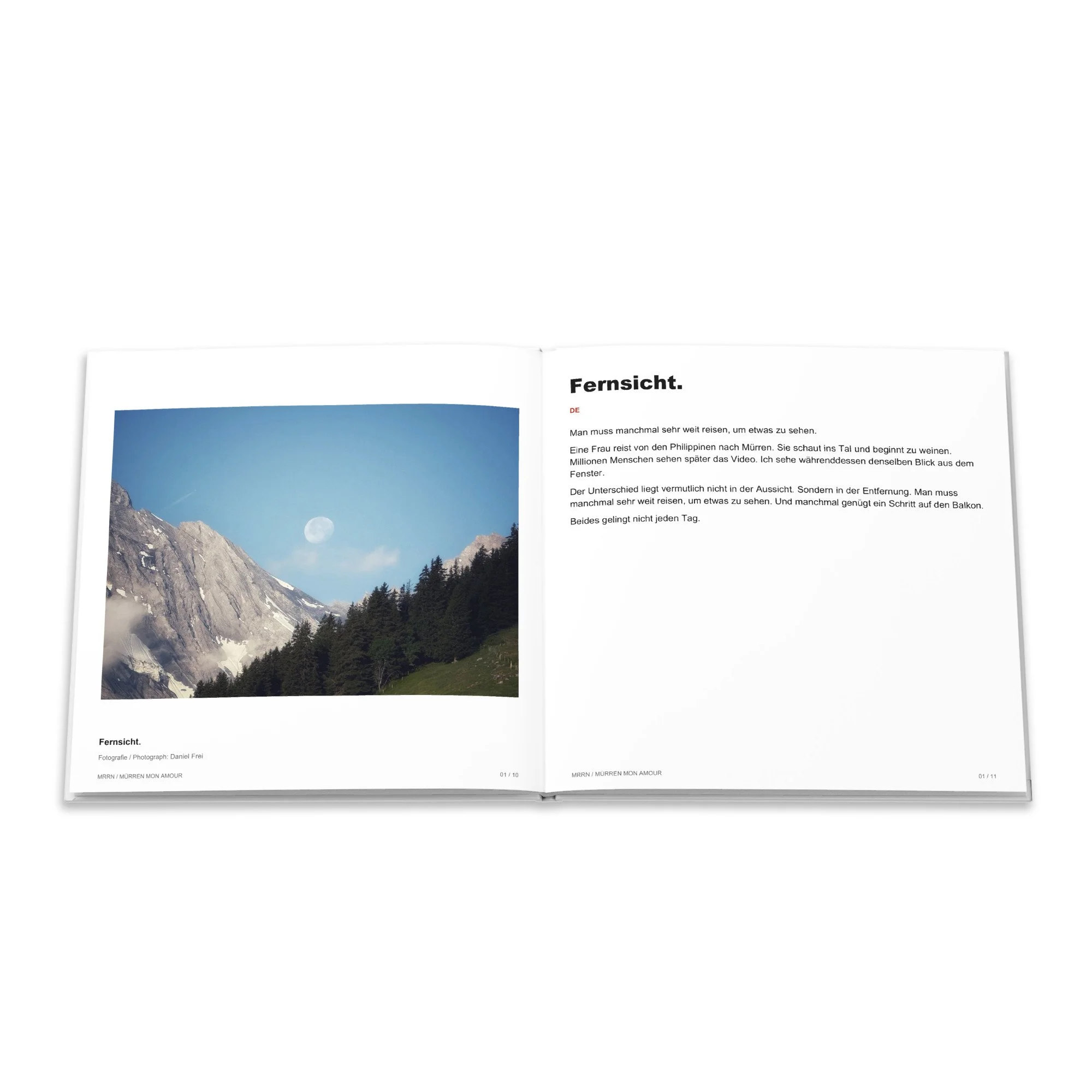 Bergfotografie und deutscher Text «Fernsicht.» im Buch Ankommen.