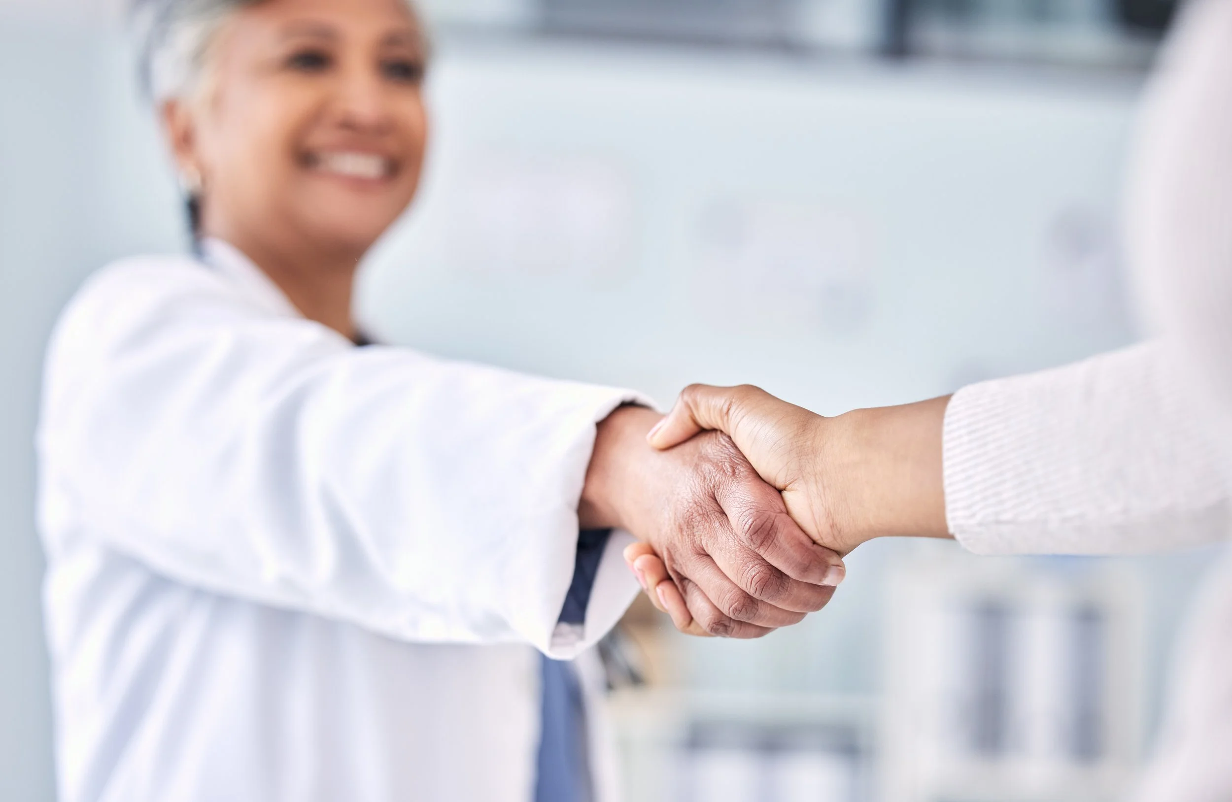 doctor-patient-and-handshake-in-partnership-meet-2025-04-06-08-56-29-utc.jpg