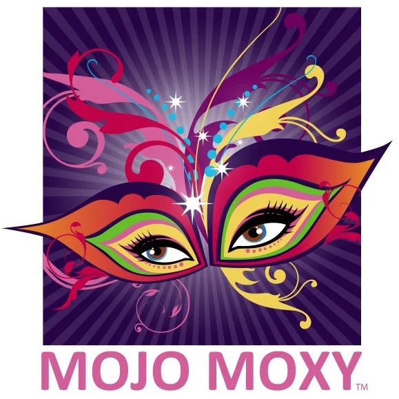 A colorful, abstract masquerade mask with vibrant pattern and swirly decorations, set against a purple radial background with twinkling stars. The words "MOJO MOXY" are displayed below in pink text.