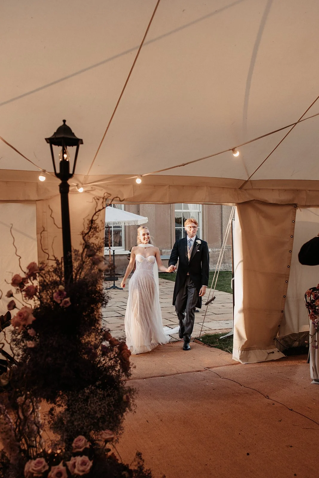 sail-and-peg-suffolk-wilderness-reserve-marquee-grand-entrance-bride-groom.jpg