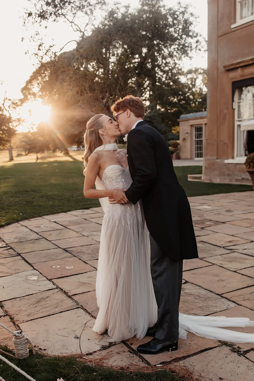 sail-and-peg-suffolk-wilderness-reserve-golden-hour-bride-and-groom-kiss.jpg