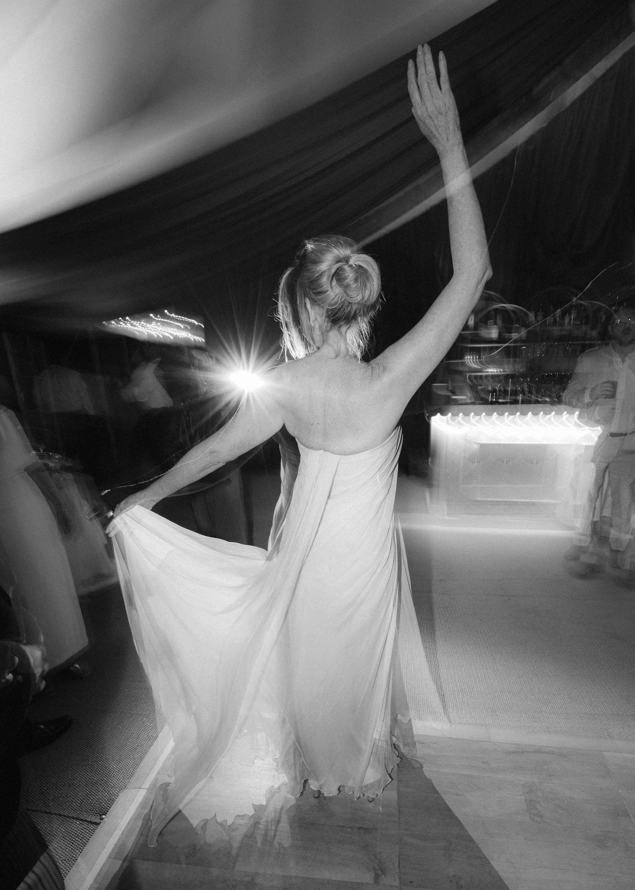 sail-and-peg-bride-dancing-spotlight-editorial-evening-marquee-wedding.jpg