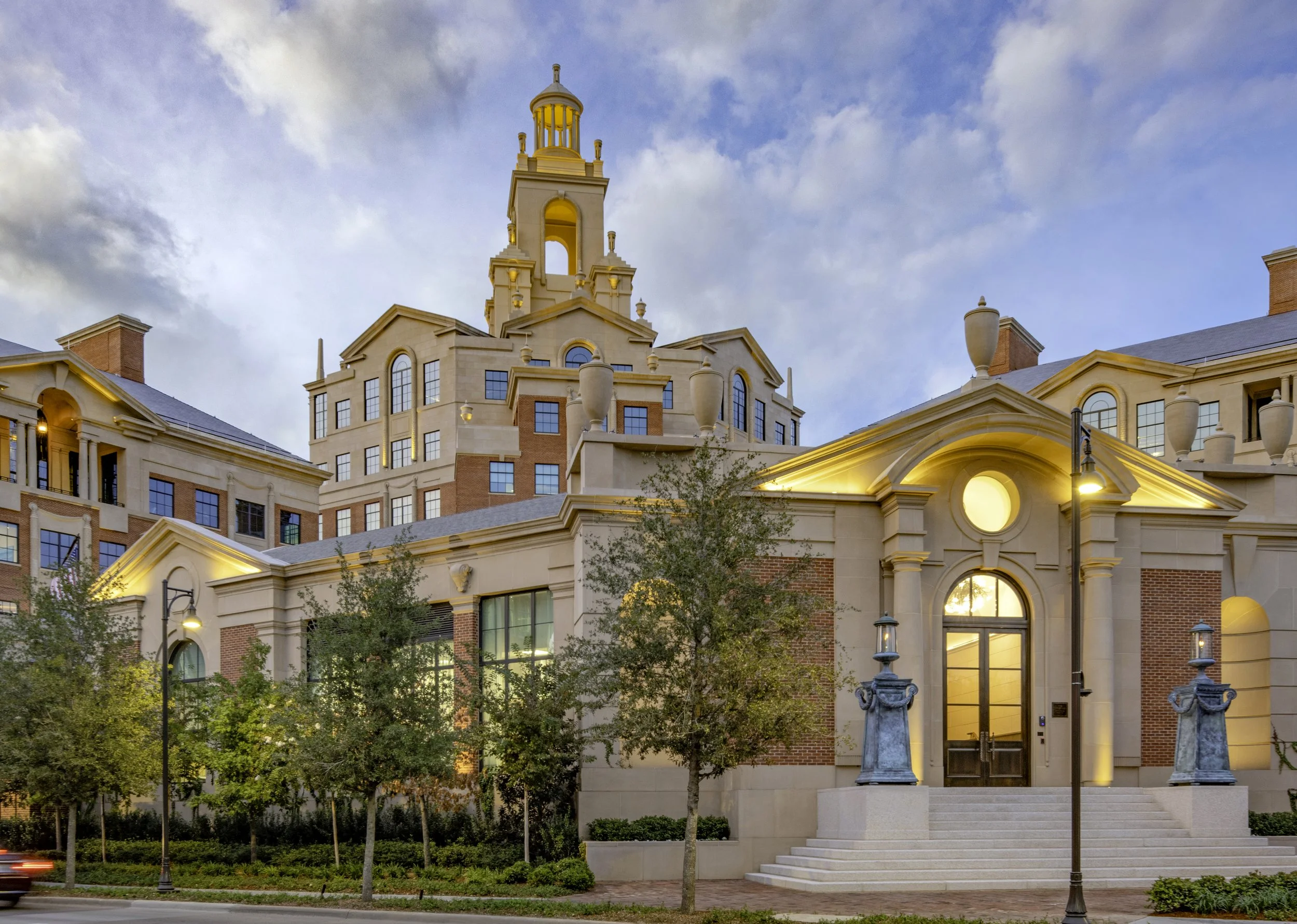 Specialized cast stone pieces work with brick across a three building complex built on a one year schedule. A 2026 Cast Stone Excellence Awards entry.