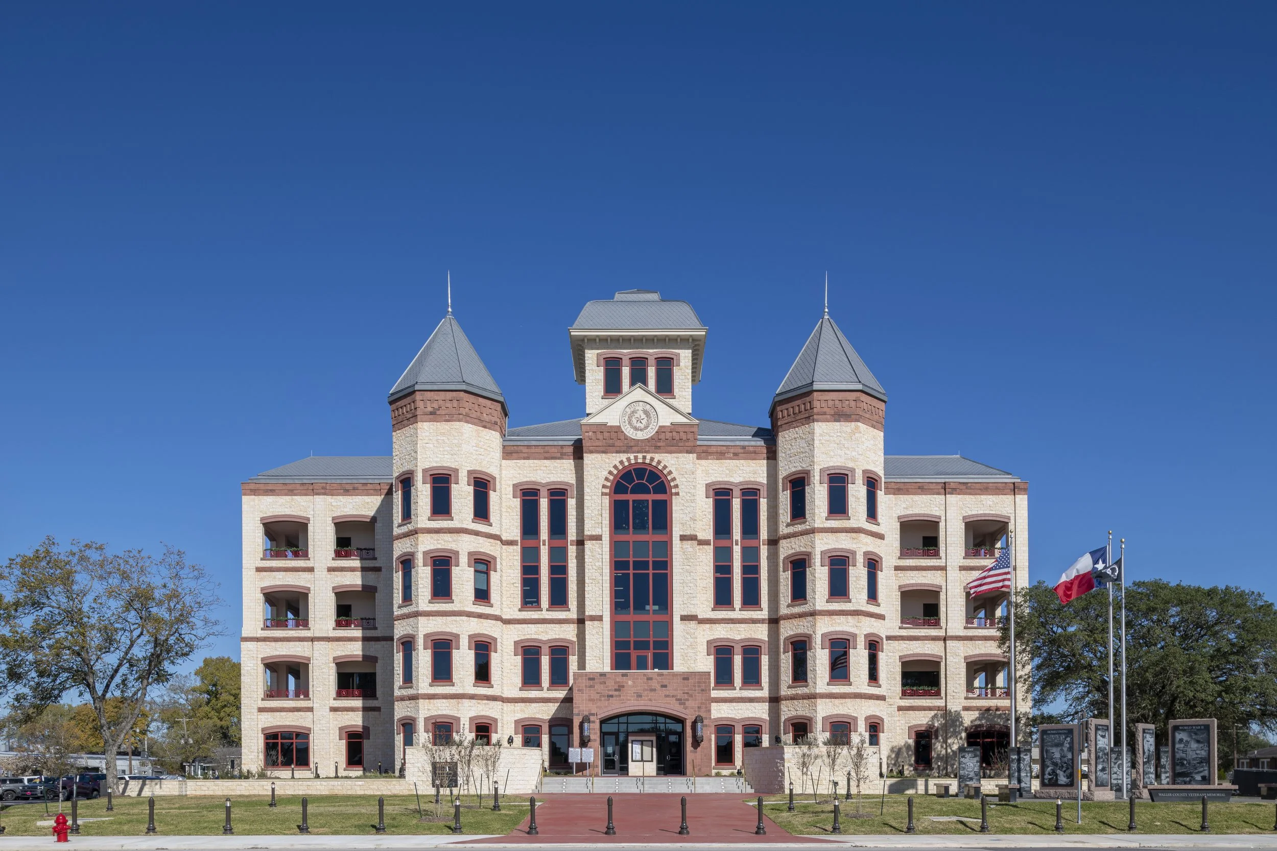 Cast stone gives the new Waller County Courthouse the civic character of its 1894 predecessor. A 2026 Cast Stone Excellence Awards entry.