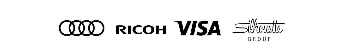 Logos of Audi, Ricoh, Visa, and Silhouette Group on a white background.