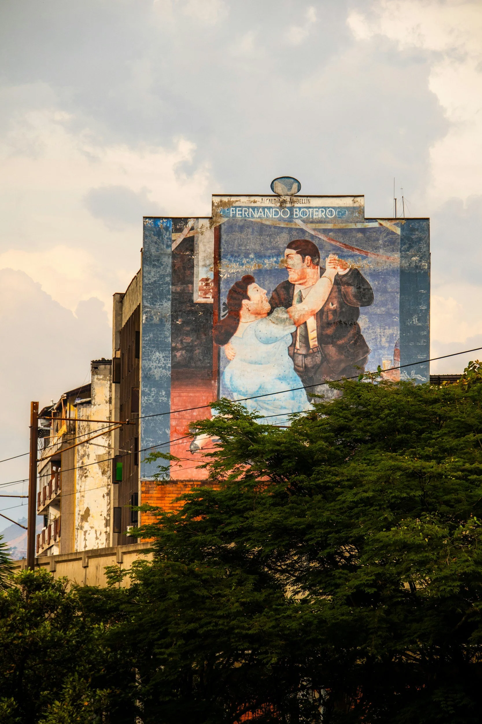 Women exploring Medellín through Botero sculptures, art and cultural transformation