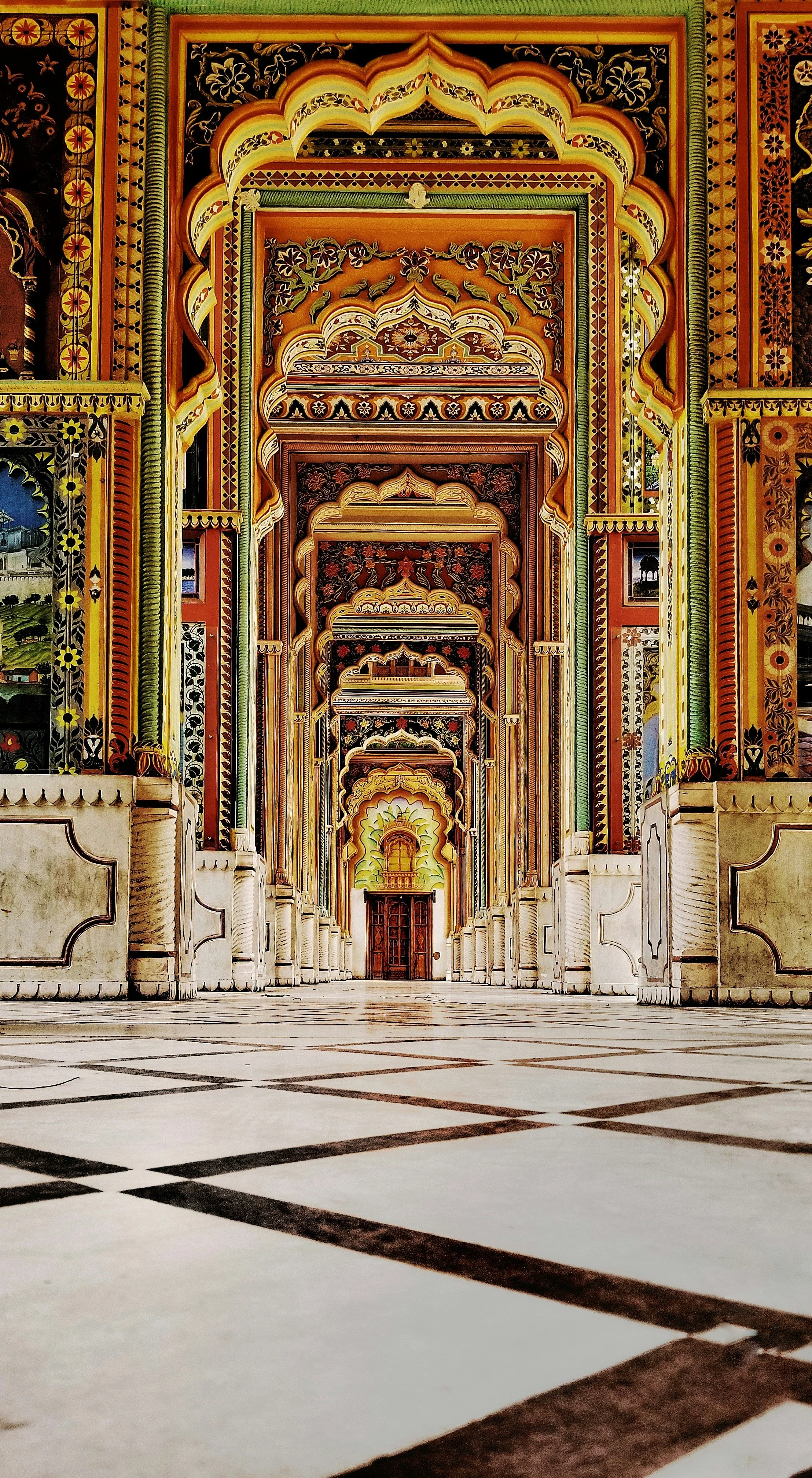 Ornate painted archways inside a palace in Rajasthan, India