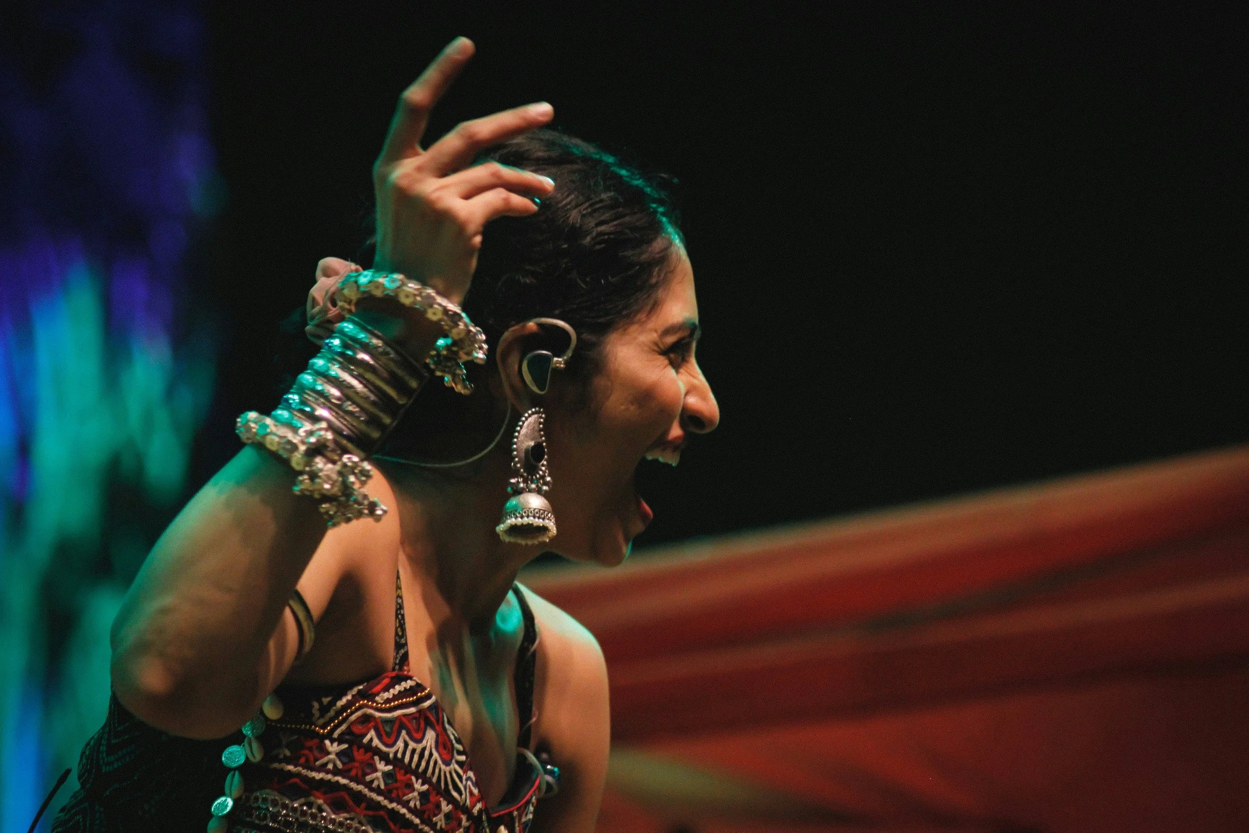 Dancer in traditional jewelry performing in India