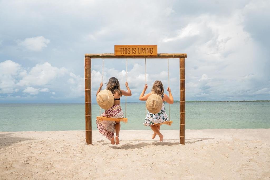 Women escaping to the Rosario Islands for snorkeling, kayaking and Caribbean beach time in Colombia