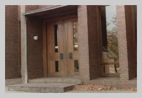 a photo of the exterior main entry door before the step was eliminated 