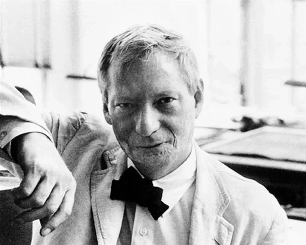 a photo of Louis Kahn, architect.  he wears a white shirt and black bowtie.