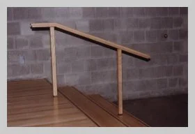 a photo showing a wooden railing installed into the chancel steps