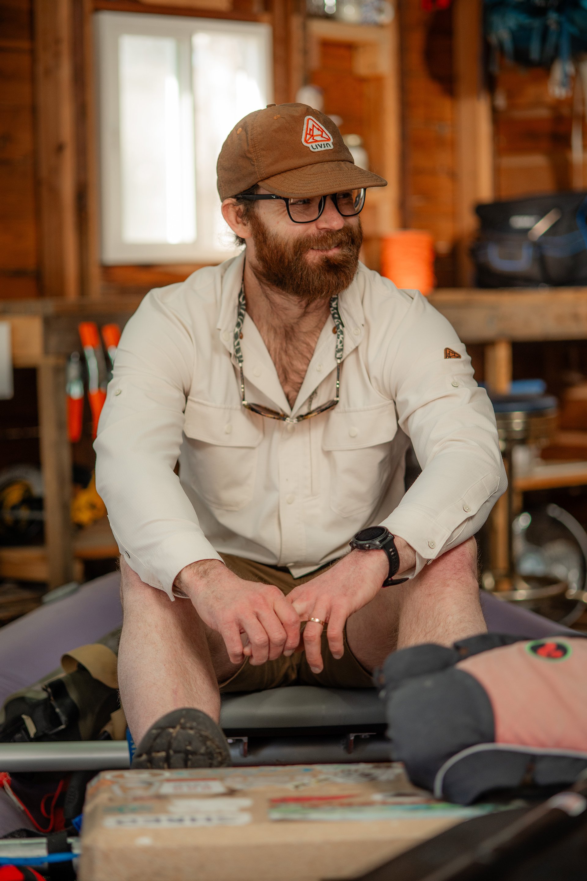 Livsn brand campaign lifestyle still, kayak preparation, Arkansas waterway