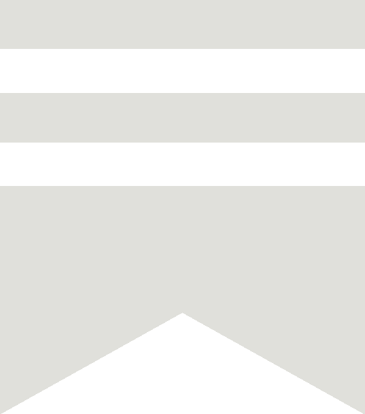 A close-up view of a gray and black striped fabric or surface with a chevron pattern at the bottom.