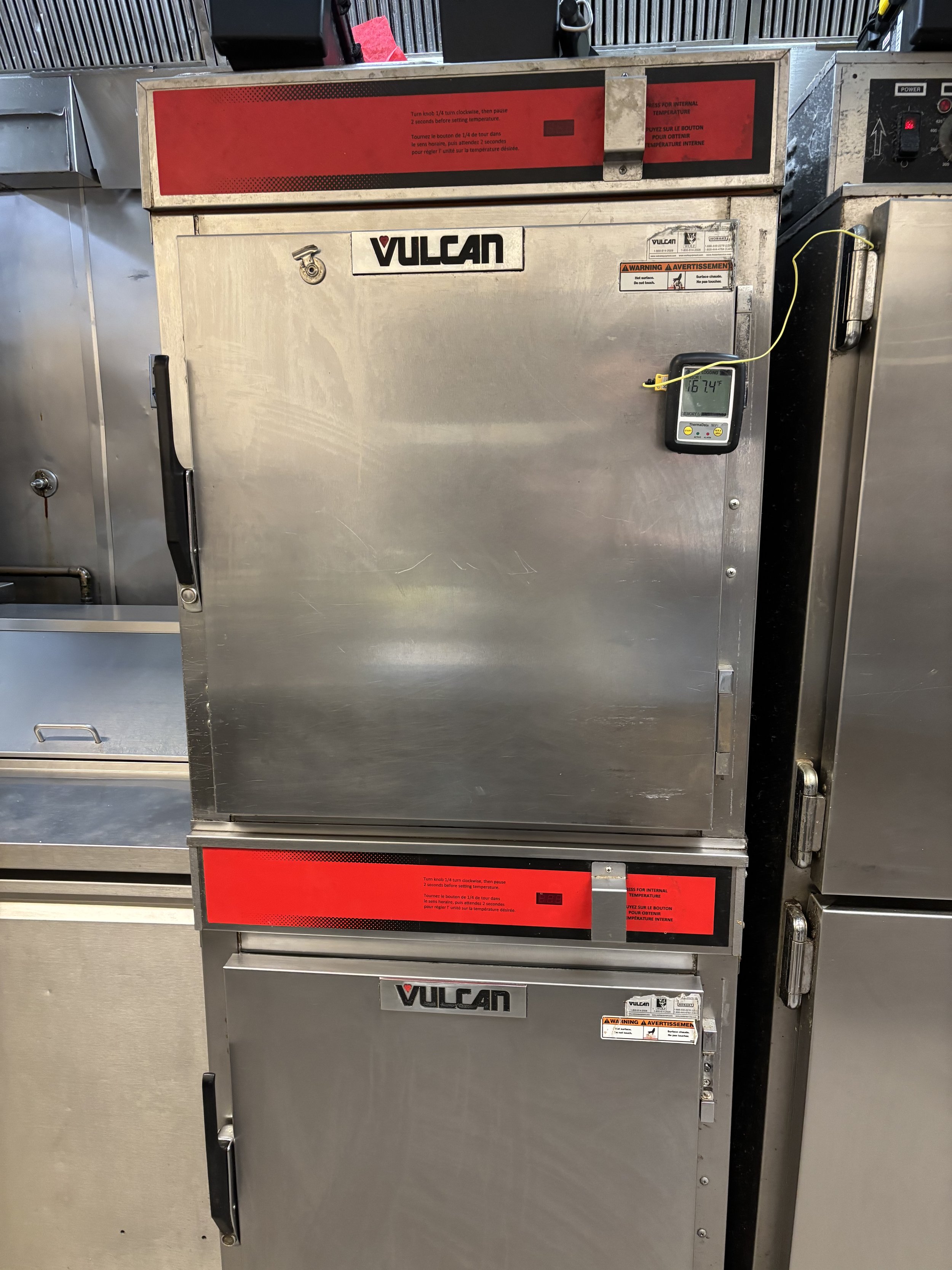 Commercial oven with "Vulcan" logo, featuring temperature display and control panel.