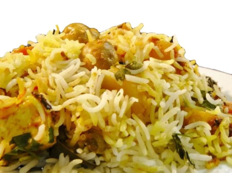 Close-up of vegetable biryani with rice and assorted vegetables.