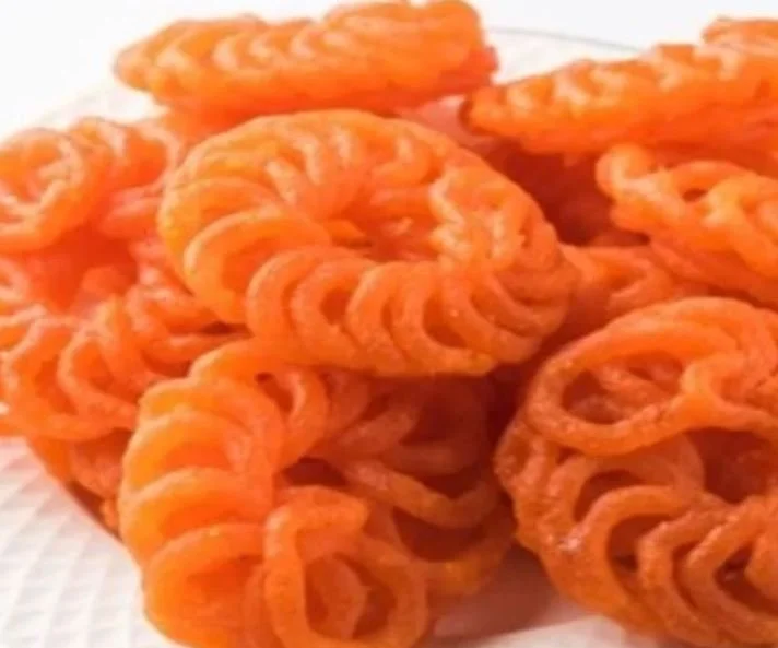 Indian sweet called Imarti or Jangiri on a plate.