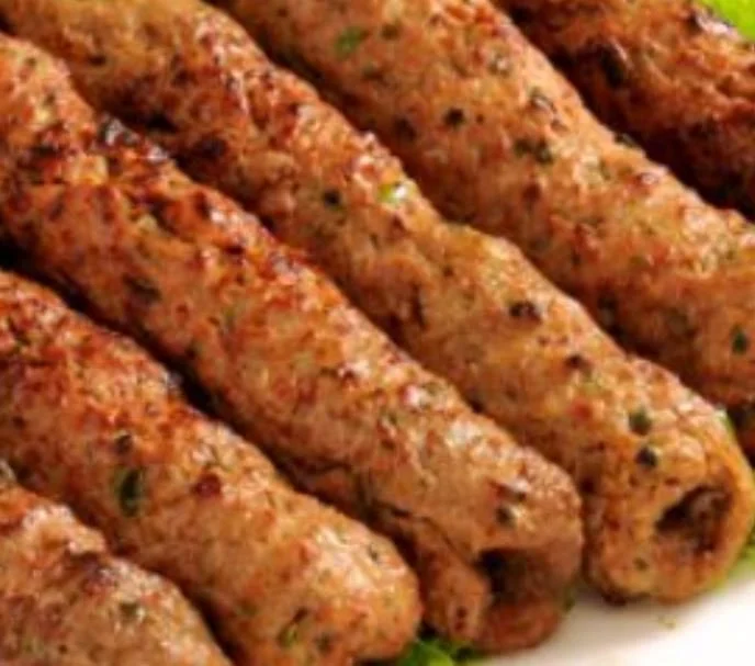 Close-up of grilled kebabs on a plate