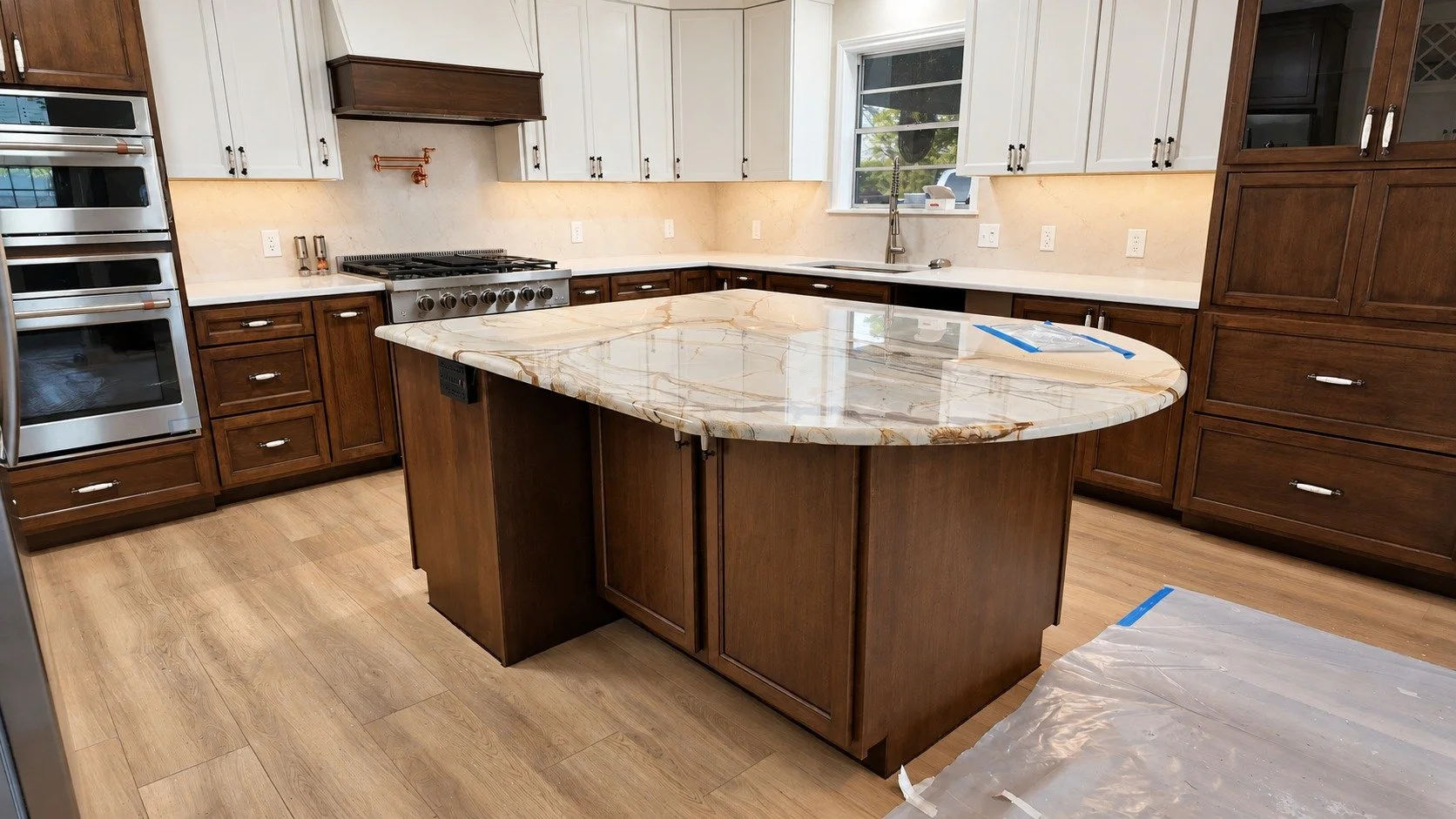 The island and sink wall bring the kitchen together.