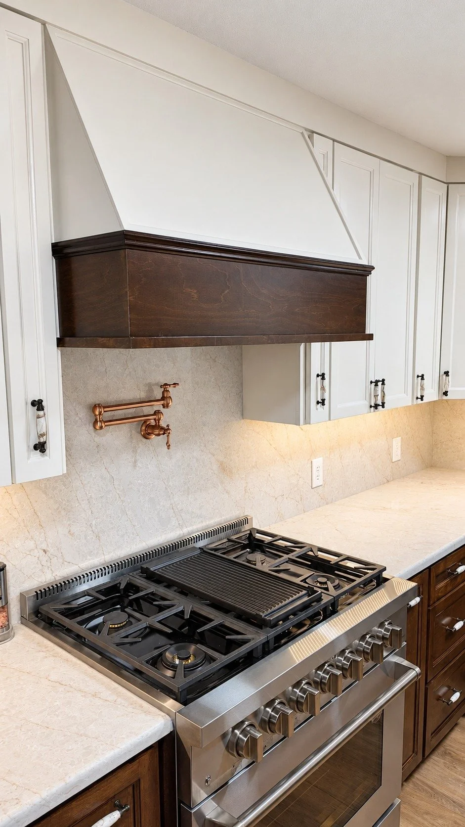 A closer look at the range surround and cabinet details.