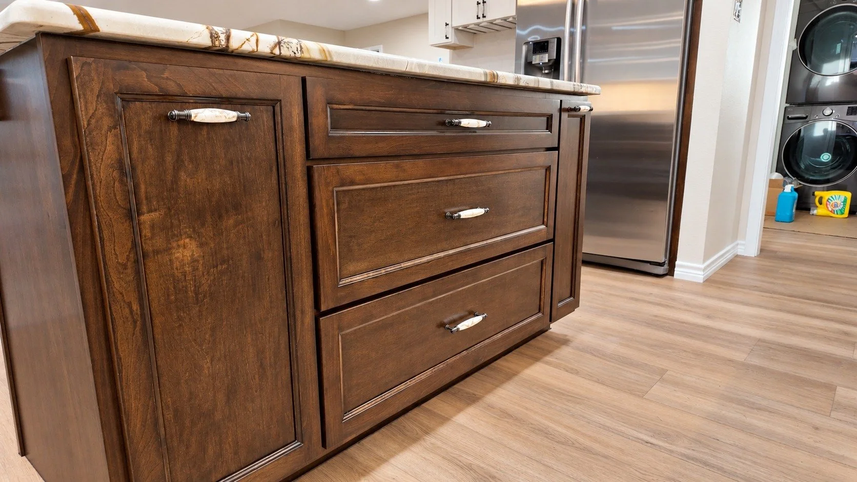 Custom island cabinetry and storage.