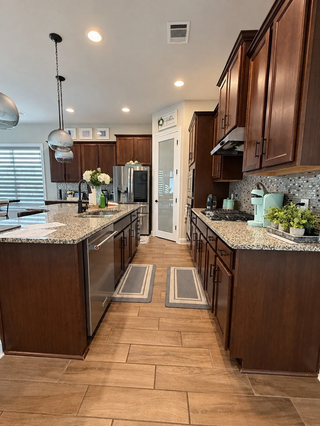Before — the original kitchen layout and finishes.