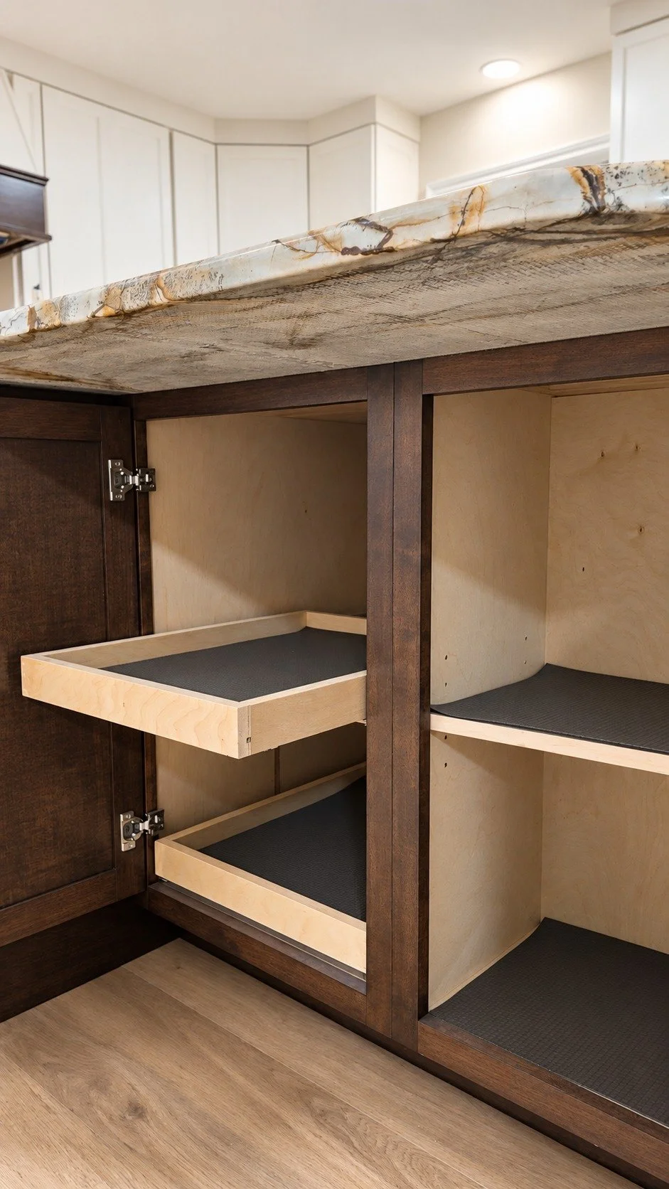 Purposeful shelving and custom cabinet storage.