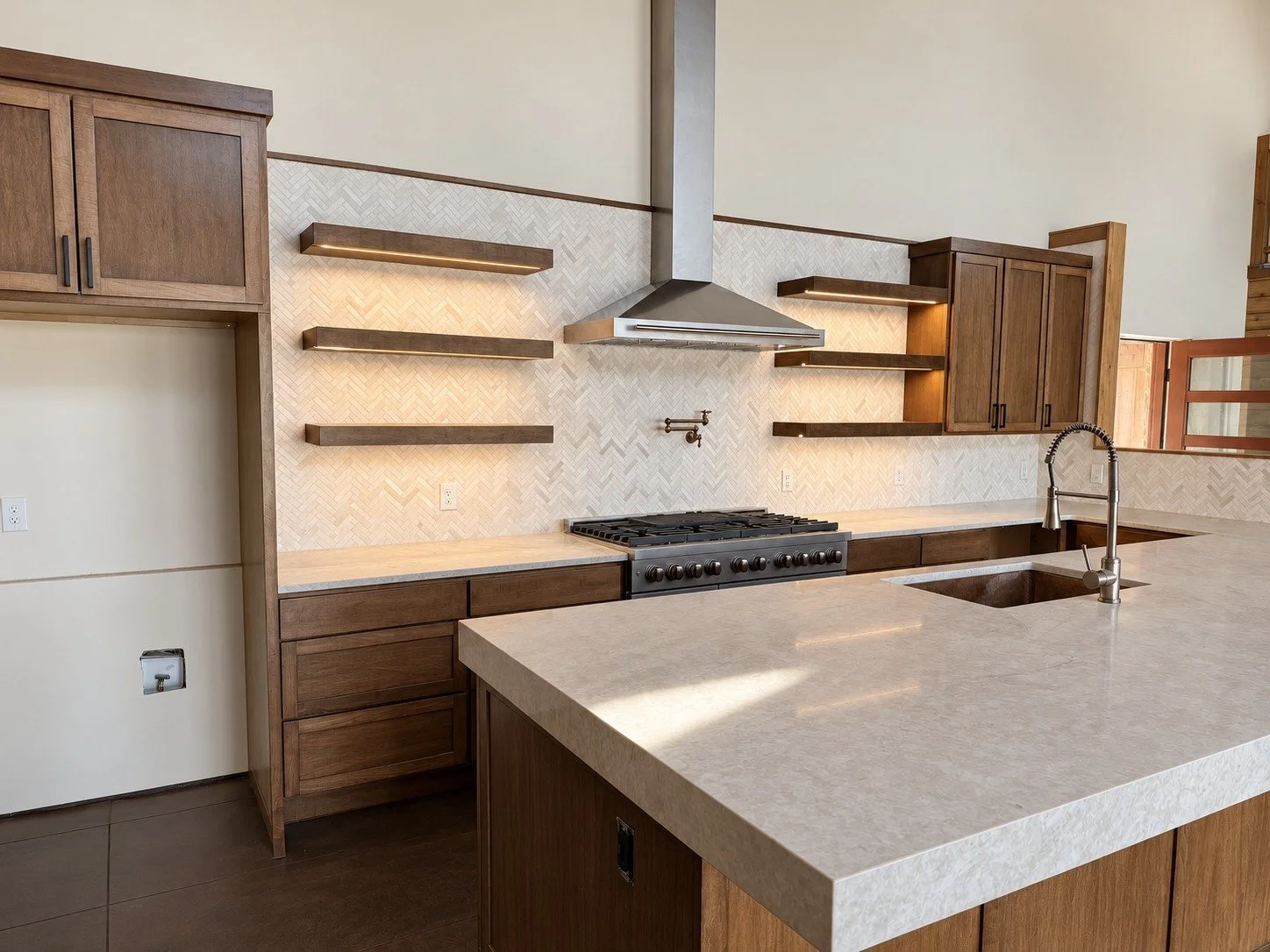 Custom storage, coordinated finishes, and thoughtful kitchen proportions.