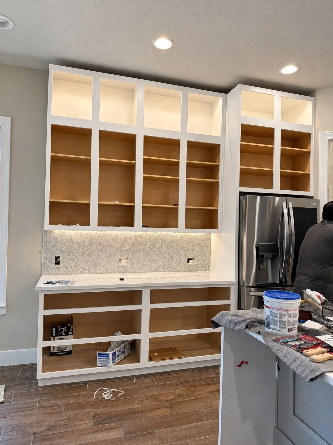 Installation — open cabinet boxes before the doors and final details.