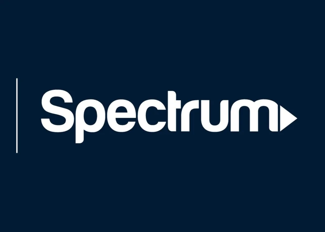 Logo for Charter Communications and Spectrum on a dark blue background.