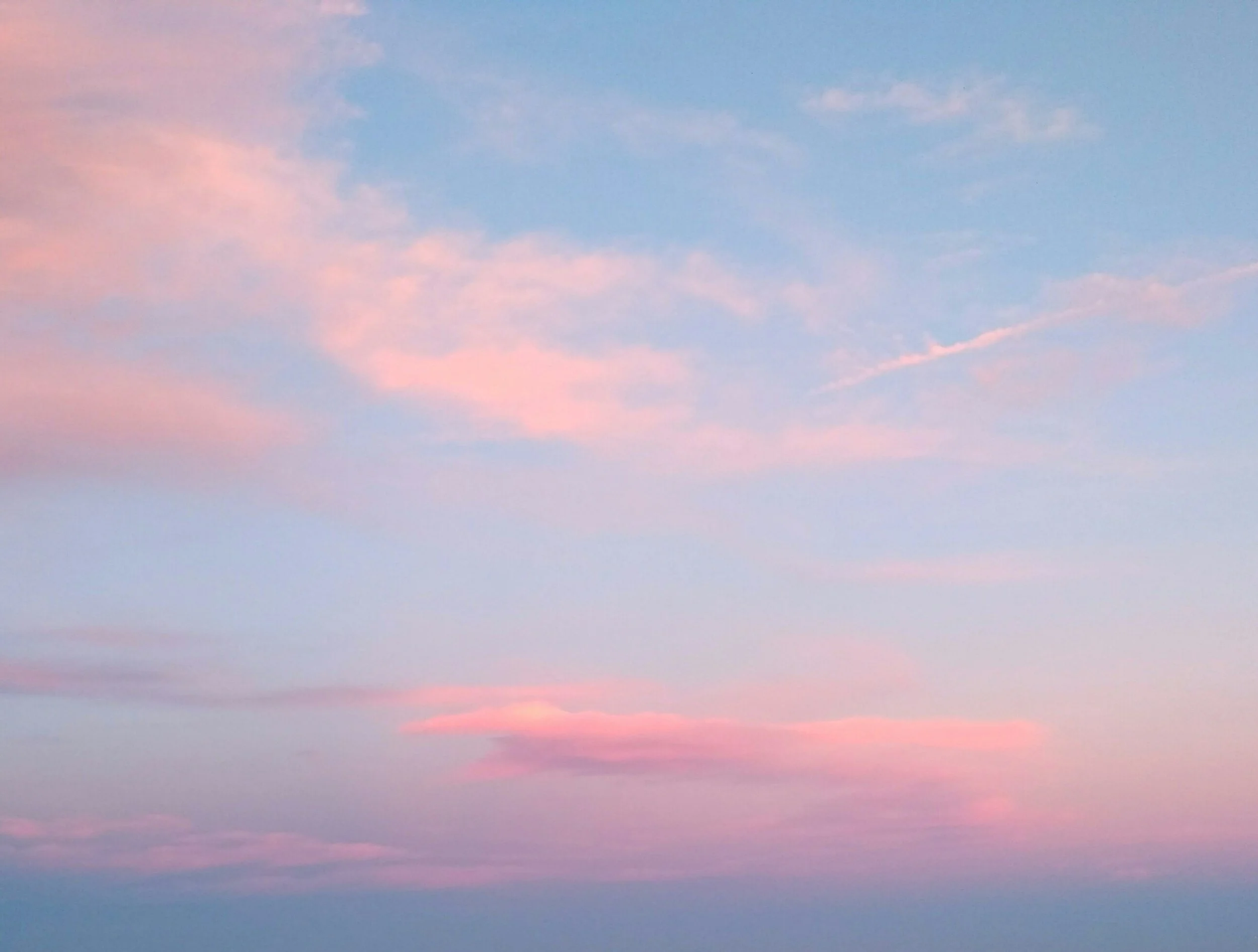 Sunset sky with pink clouds