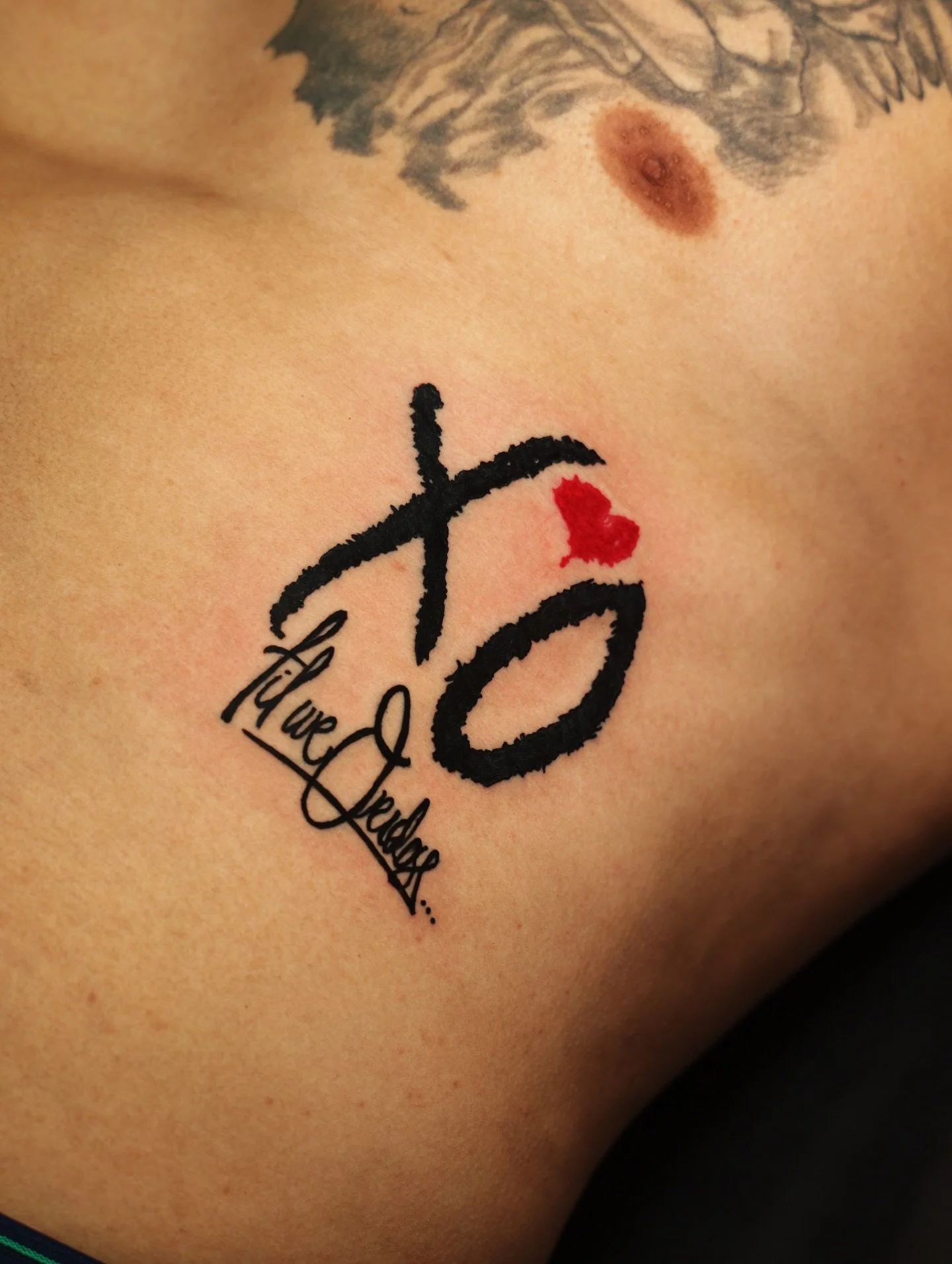 XO till we overdose tattoo done by @jawad.mistrah.tattoos at our shop ✨

#tattoo #tattoos #dearborn #detroit #theweeknd #smalltattoo #tattooideas