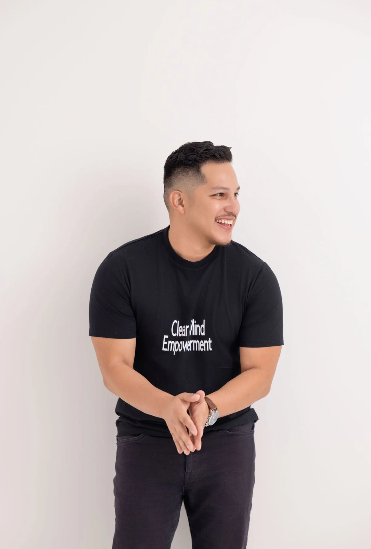 Person with glasses looking to the side