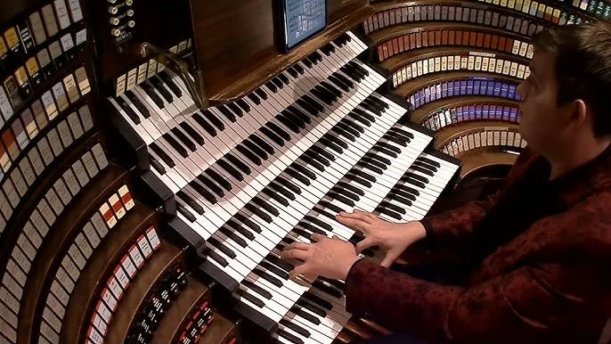 Joshua Stafford plays the Wanamker organ with its six keyboards and hundreds of stops.