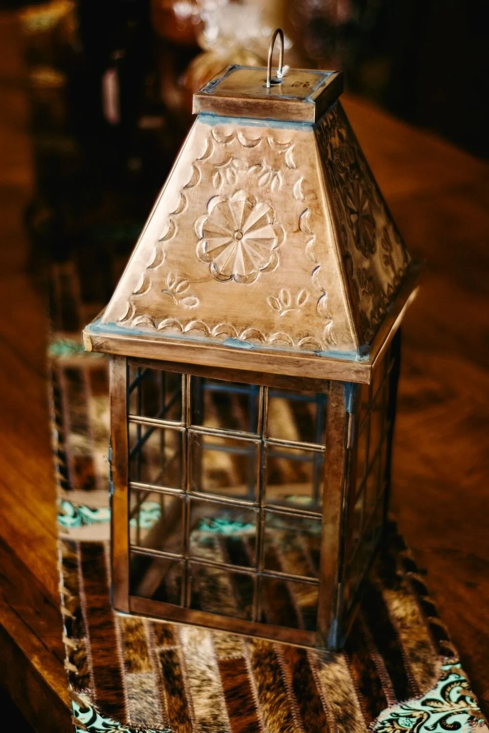 Bronze punched tin luminarias from Mexico.